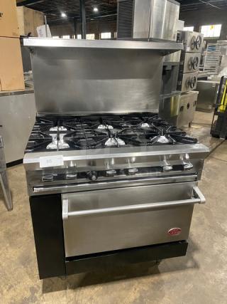 DCS Commercial Stainless Steel Natural Gas Powered 6 Burner Range/Oven Combo! With Back Splash & Overhead Salamander Shelf! With Wired Oven Racks! On Legs!