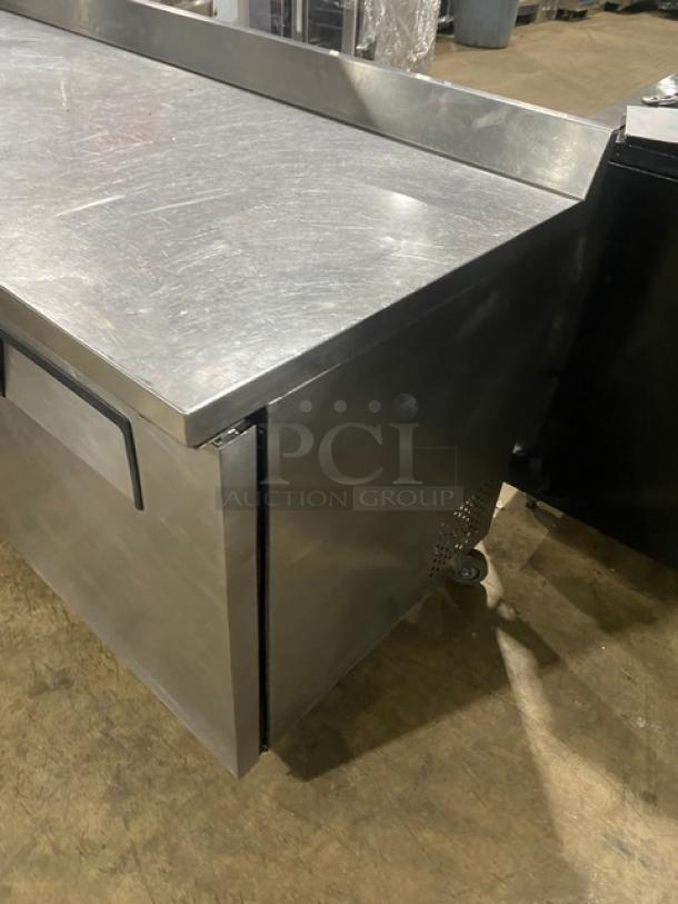 True Commercial Stainless Steel 3 Door Refrigerated 72" Worktop Table! Energy Star Certified! With Up Turned Back Splash! With Poly Coated Wire Racks! Model: TWT-72 SN: 7702017! 115V 1 Phase! On Casters! - Image 2 of 8