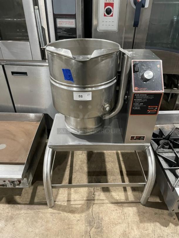 Groen! 2017! Late Model! Commercial Stainless Steel Electric Powered 2/3 Steam Jacketed 40 Qt. Tilting Steam Kettle! With Smooth Action Hand Tilting Crank! Mounted On Equipment Stand! Model: TDB-40 SN: 100883! 208V 3 Phase! On Legs! - Image 1 of 9