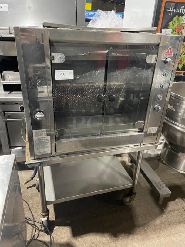 Rotisol! 2017 Late Model! Commercial Stainless Steel Natural Gas Powered Grand Flammes Millenium Vertical French Rotisserie! With Single Undershelf Equipment Cart! Model: 975.2 SN: 7533! 220-240V 1 Phase! On Casters! - Image 1 of 9