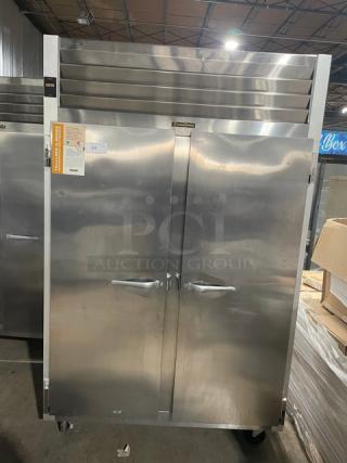 Traulsen G-Series Commercial Stainless Steel Solid 2 Door Reach In Freezer! Energy Star Certified! With Poly Coated Wire Racks! Model: G22010 SN: T26007K12! 115V 1 Phase! On Casters!