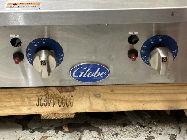 NEW SCRATCH AND DENT! 2017 Globe GG60TG Stainless Steel 60" Heavy-Duty Gas Countertop Griddle with Thermostatic Controls - 150,000 BTU This Unit was bought NEW as a backup and never installed placed in storeroom. - Image 2 of 5