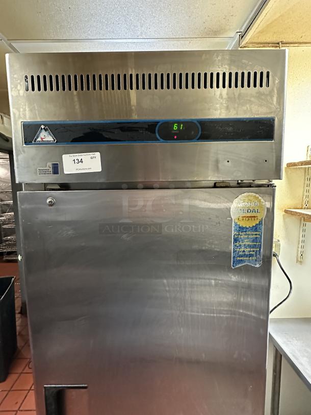 Everest Commercial Stainless Steel Solid Single Door Reach In Freezer! With Poly Coated Wire Rack! Model: EBF1 115V 1 Phase! On Casters! 
Powered On when tested! - Image 1 of 3