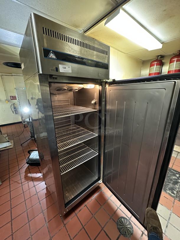 Everest Commercial Stainless Steel Solid Single Door Reach In Freezer! With Poly Coated Wire Rack! Model: EBF1 115V 1 Phase! On Casters! 
Powered On when tested! - Image 2 of 3