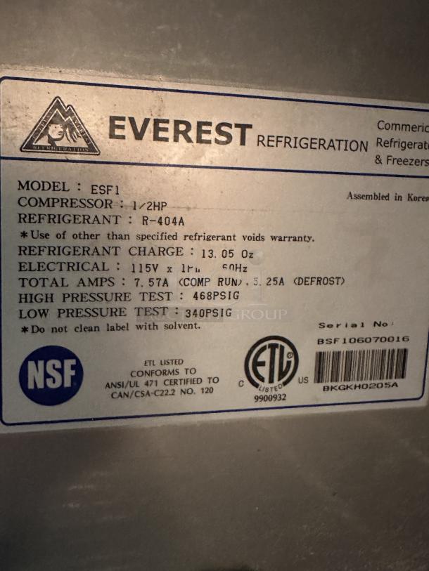 Everest Commercial Stainless Steel Solid Single Door Reach In Freezer! With Poly Coated Wire Rack! Model: EBF1 115V 1 Phase! On Casters! 
Powered On when tested! - Image 3 of 3