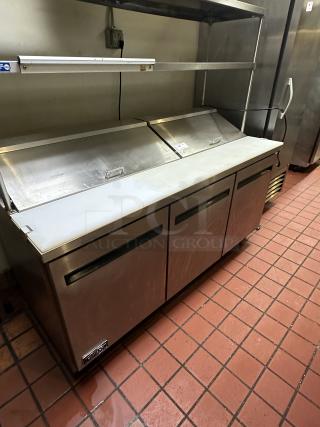 Arctic Air AST72R 71.5-Inch 3-Door Refrigerated Sandwich/Salad Prep Table 115v Powered On, with Cutlery Board