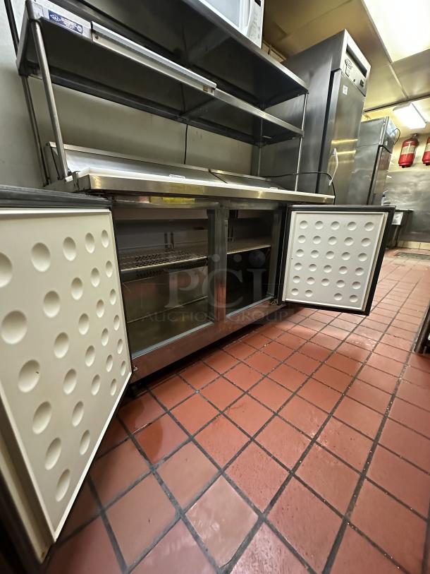 Arctic Air AST72R 71.5-Inch 3-Door Refrigerated Sandwich/Salad Prep Table 115v Powered On, with Cutlery Board - Image 5 of 7