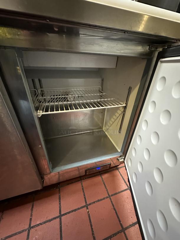 Arctic Air AST72R 71.5-Inch 3-Door Refrigerated Sandwich/Salad Prep Table 115v Powered On, with Cutlery Board - Image 6 of 7