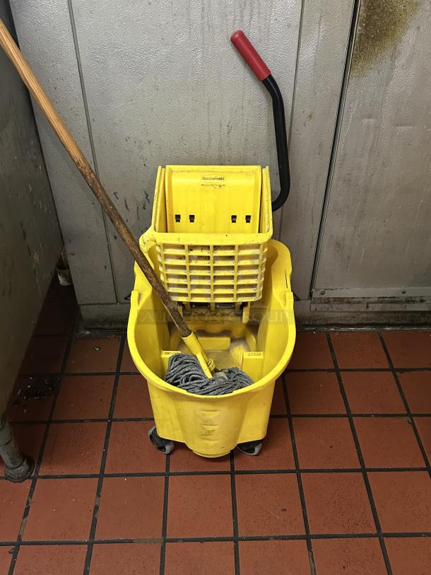 Rubbermaid® FG758088YEL WaveBrake® 35 Qt. Yellow Mop Bucket with Side Press Wringer 
Wood Mop handle & mop head - Image 2 of 2