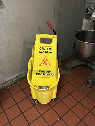 Rubbermaid® FG758088YEL WaveBrake® 35 Qt. Yellow Mop Bucket with Side Press Wringer
Caution Wet Floor Sign