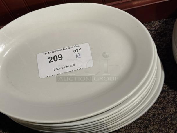 12 1/2" x 8 7/8" Ivory (American White) Wide Rim Rolled Edge Oval Stoneware Platter 
10xBid - Image 1 of 1