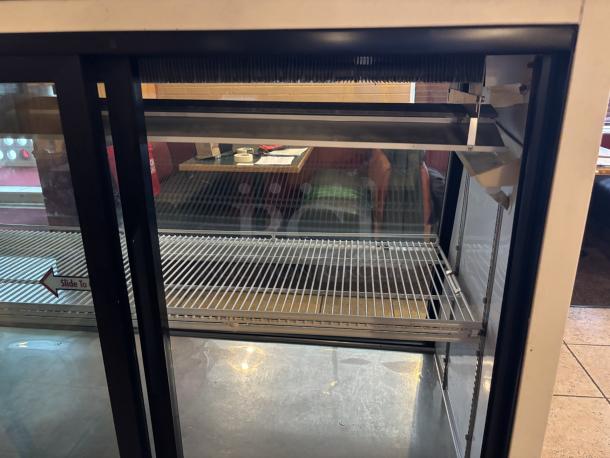 True Manufacturing Co, refrigerated Display Case, Powers on and Working, Very Clean
Voltage 116, Model # TSID-72-3, high Side 312, Low Side 140 F.L. Amps - 9.4
73x41 - Image 3 of 6