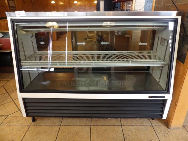 True Manufacturing Co, refrigerated Display Case, Powers on and Working, Very Clean
Voltage 116, Model # TSID-72-3, high Side 312, Low Side 140 F.L. Amps - 9.4
73x41 - Image 1 of 6