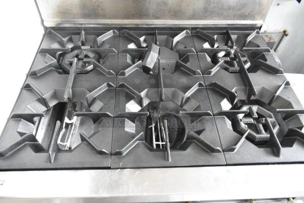 DCS Stainless Steel Commercial Natural Gas Powered 6 Burner Range w/ Oven, Over Shelf and Back Splash. - Image 5 of 7