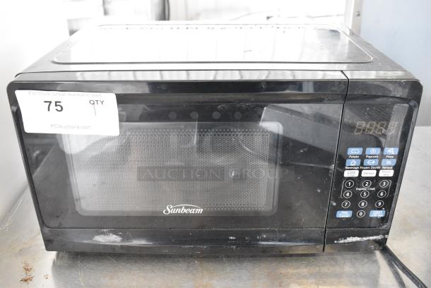 Sunbeam Metal Countertop Microwave Oven w/ Plate 120 Volts, 1 Phase. - Image 1 of 7