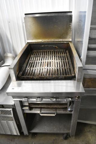 Montague Stainless Steel Commercial Natural Gas Powered Charbroiler Grill w/ Under Shelf on Commercial Casters.