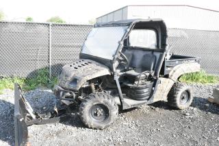 Cub Cadet 2 Seat Volunteer UTV Utility Vehicle. Selectable 2x2 / 4x4, Winch, Plow, Low Range, Dump Bed, Hitch, Bull Bar, Hurst Shift Selector, Kohler Engine. Engine Blows Blue Smoke, Bad Transmission, 2 Tires Need To Be Replaced. Unit Does Not Run