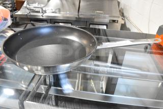 BRAND NEW SCRATCH AND DENT! Vigor 473SSFRY12X SS1 Series 12" Stainless Steel Non-Stick Fry Pan with Aluminum-Clad Bottom, Excalibur Coating, and Helper Handle
