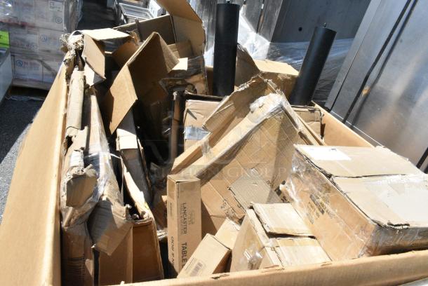 16 BRAND NEW SCRATCH AND DENT! Boxes Including 164TS1800 Lancaster Table & Seating 18" Cast Iron Table Base Spider, Four 164TCOLROD25 Lancaster Table & Seating 25 3/16" Standard Height Table Base Column and Rod, 164TB3030 Lancaster Table & Seating 30" x 30" Cross Cast Iron Table Base Plate, 600UT2436G Regency 18-Gauge Galvanized Steel Adjustable Shelf for 24" x 36" Work Tables, 600TSS3036 Regency Spec Line 30" x 36" 14 Gauge Stainless Steel Commercial Work Table with Undershelf. 16 Times Your Bid! - Image 2 of 11