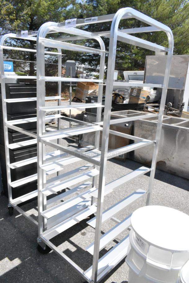 BRAND NEW SCRATCH AND DENT! Channel OT-8 Metal Commercial 8 Tray Aluminum Oval Tray Rack on Commercial Casters. - Image 1 of 6