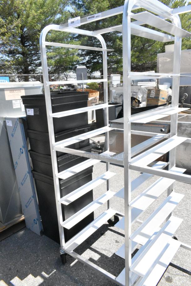 BRAND NEW SCRATCH AND DENT! Channel OT-8 Metal Commercial 8 Tray Aluminum Oval Tray Rack on Commercial Casters. - Image 1 of 6