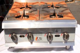 BRAND NEW SCRATCH-N-DENT! Cooking Performance Group R-CPG-24-NL 4 Burner Gas Countertop Range / Hot Plate - 88,000 BTU.  Easily removable surface rust from rain & (Center) Burner support bar is slightly bent down. Serial # 2410007287