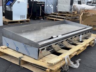 BRAND NEW SCRATCH-N-DENT! Wolf by Vulcan AGM72-NAT Natural Gas 72" Heavy-Duty Gas Countertop Griddle with Manual Controls, 1" thick polished steel griddle plate - 162,000 BTU. Serial No.: 650254103. Missing legs, (2) Guards around controls are bent downward, Front cover needs to be adjusted, Dust on griddle top. Includes Conversion Kit.