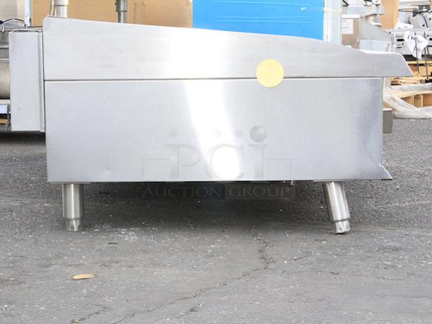 BRAND NEW SCRATCH & DENT! Cooking Performance Group GT-CPG-60-NL 60" Gas Countertop Griddle with Thermostatic Controls - 150,000 BTU. S/N: 2410007374 Legs are bent and unit is dented. - Image 8 of 11