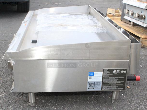 BRAND NEW SCRATCH & DENT! Cooking Performance Group GT-CPG-60-NL 60" Gas Countertop Griddle with Thermostatic Controls - 150,000 BTU. S/N: 2410007374 Legs are bent and unit is dented. - Image 9 of 11