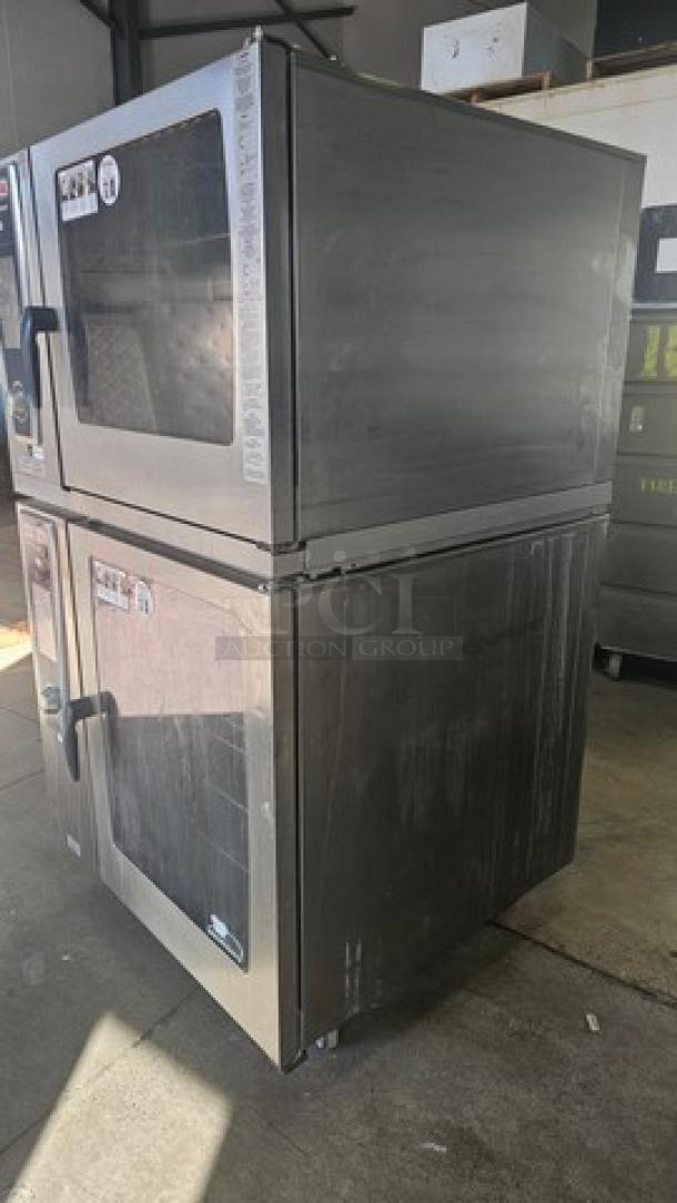 Rational Double Stack Combi Master Steamer Oven. On Casters. Very Good Condition.

(Top) SCCWE62G Natural Gas Combi Convection Steam Oven. 1 PH, 208 V, 60 Hz, 15 A.
(Bottom) SCCWE102 Self Cooking Center Electric Combi Oven. 480V, 3 PH, 37kW, 60 Hz. - Image 6 of 7