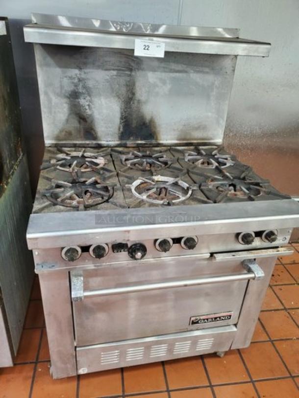 Garland H286 Natural Gas 6 Burner Range w/ Oven Base. Good Condition. - Image 1 of 7