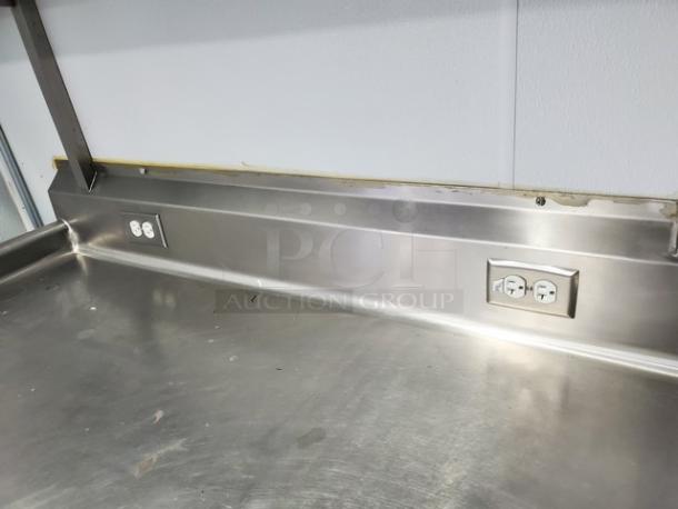 Continental Keg Cooler/ Custom Workstation. No Taps included. Taps were removed (essentially turning it into an under counter cooler) and a stainless steel table top was attached to the top of the cooler. The cold air generated from the cooler travels up through the holes where the taps used to be and keeps the table top nice and cool as well. Overhead shelf is also attached. Very cool custom work station. - Image 7 of 8