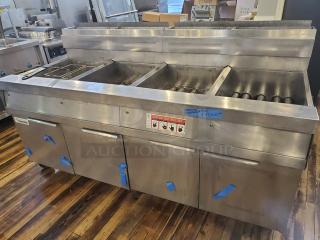 Frymaster SCFHD460GNT 4 Unit Natural Gas Floor Fryer System. 60 Hz, 1 PH, 110-120V.