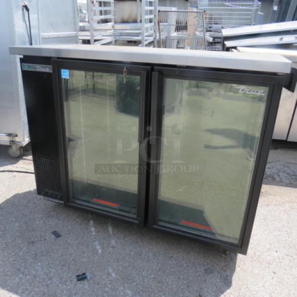 One WORKING True 2 Door Back Bar Cooler With 3 Racks And Keys. Model# TBB-24-48-g-hc-ld. 115 Volt. 49X24.5X39.5. $3798.05 - Image 1 of 4