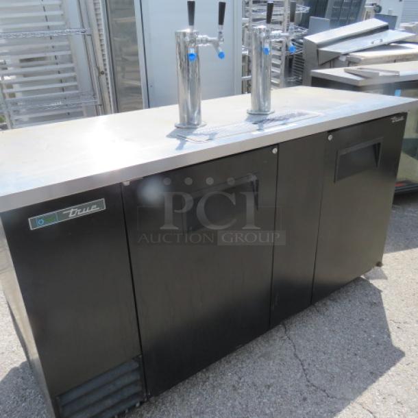 One WORKING True 2 Door Kegorator With 2 Towers, 4 Taps, And Drain Tray. 115 Volt.  Model# TDD-3-HC. 69X28X39. $3870.58 - Image 2 of 3