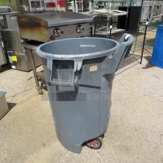 One Brute Rubbermaid Trash Can On Wheels.