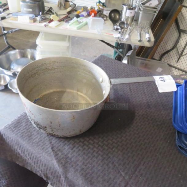 One 11 Inch Aluminum Sauce Pan. - Image 1 of 1