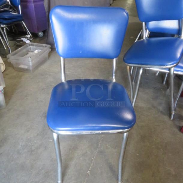 Chrome Chair With A Blue Cushioned Seat And Back. 2XBID - Image 1 of 2