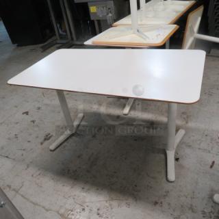 One IKEA White Laminate Tabletop On A Dual Pedestal Base.  51X27.5X29