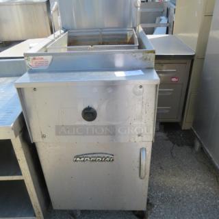 One 75lb  Imperial Natural Gas Deep Fryer On Casters And Basket. WORKING WHEN REMOVED. 19.5X35X45. $9438.00