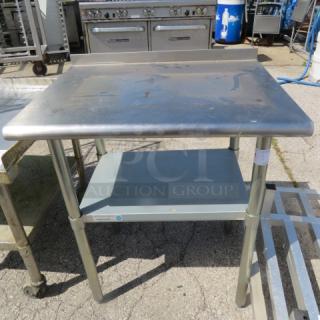 One Stainless Steel Table With Under Shelf. 30X24X36