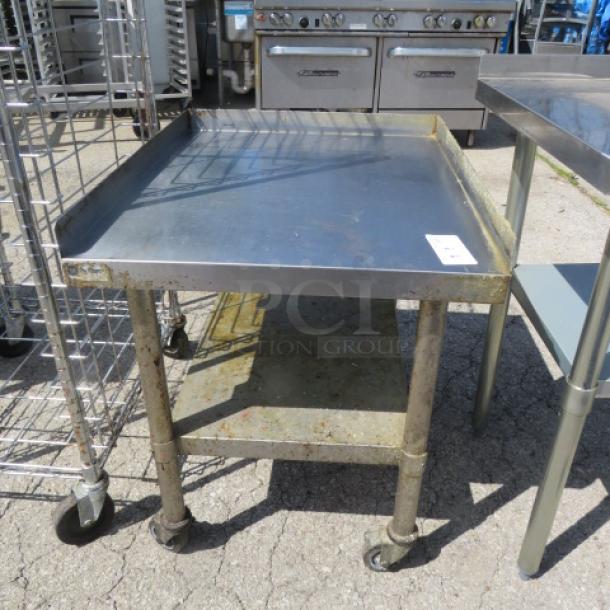 One Stainless Steel Equipment Table With under Shelf On Casters. 24.5X30X30 - Image 1 of 1