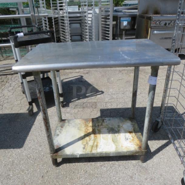 One Stainless Steel Table With under Shelf. 36X24X35.5 - Image 1 of 1