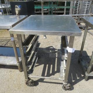 One SS Speed Rack With Stainless Steel Top On Casters. 26X30X35