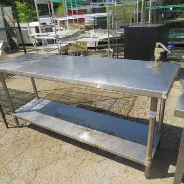 One Stainless Steel table With A Stainless Steel Under Shelf And A 10lb Can Opener. 72X24X33.5 - Image 1 of 2