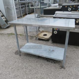 One Stainless Steel Table With A SS Under Shelf. 49X24X35