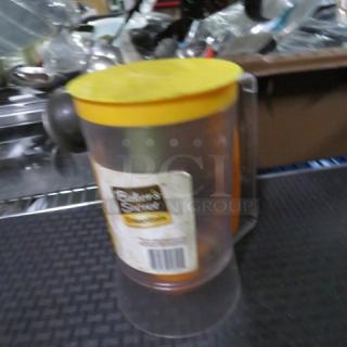 One Bakers Secret Batter Dispenser.