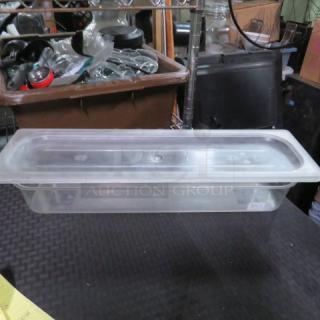 One 1/2 Size Long 4 Inch Deep Clear Food Storage Container With Lid.