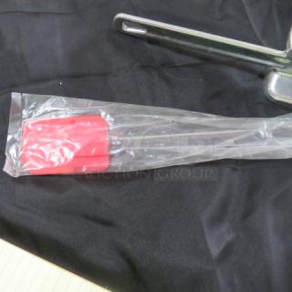 One NEW Spatula.