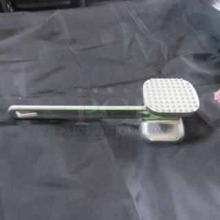 One NEW Meat Tenderizer.